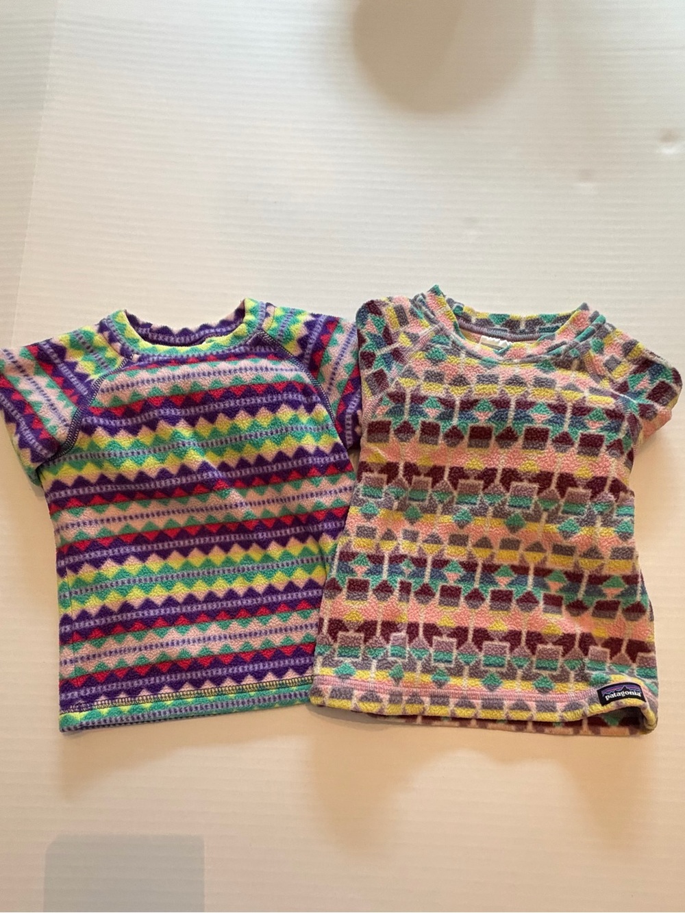 Pair of Patagonia Baby Micro D Crew Fleece Tops 12-18 months